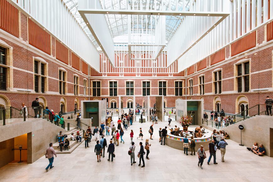 Visitors walking in the atrium of the Rijksmuseum