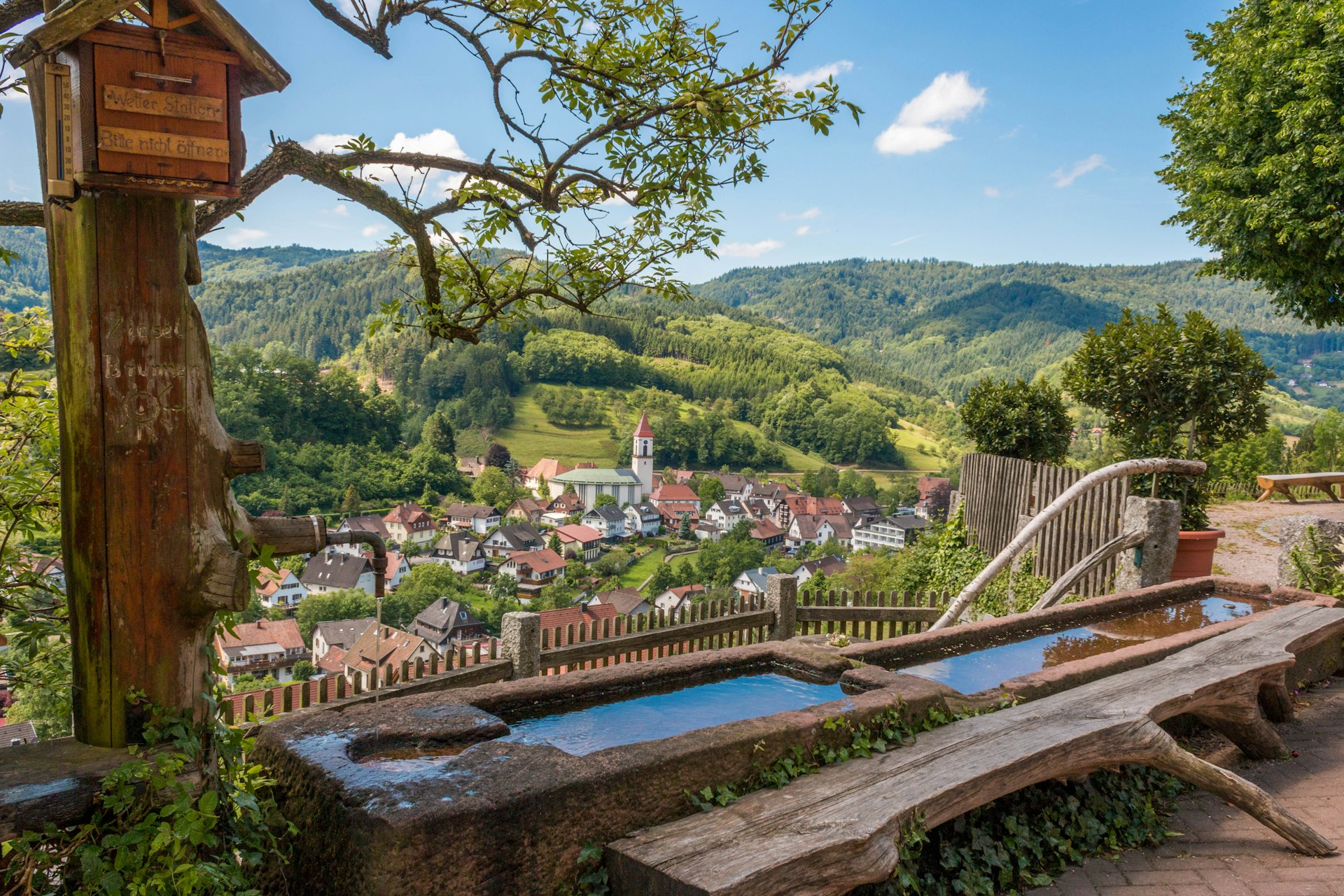 Photo of hilltop pool overlooking the small village of Ottenhöfen im Schwarzwald in the Black Forest, Germany