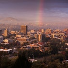 USA, North Carolina, Asheville, elevated city skyline with rainbows, dawn.