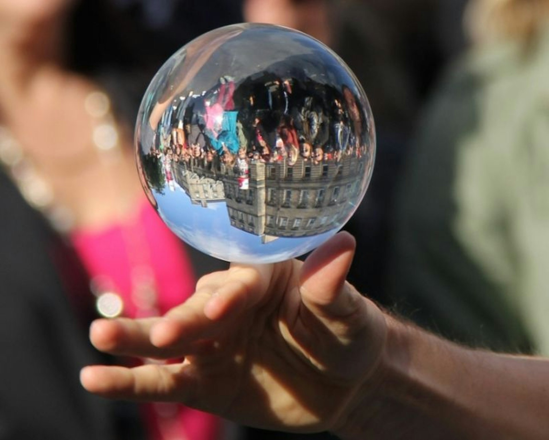 The Edinburgh Fringe, crowd reflecting in a glass globe