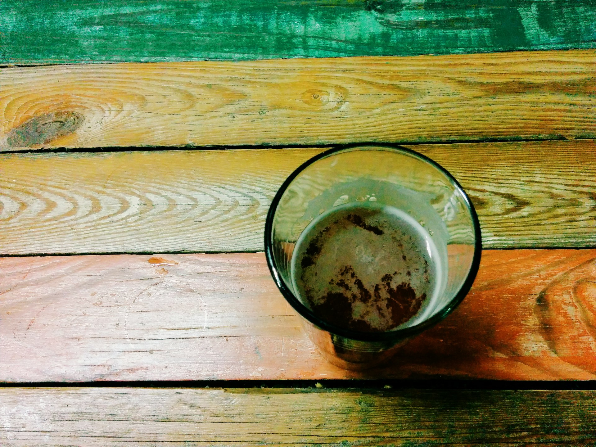 Glass Of Beer On Colorful Wooden Table