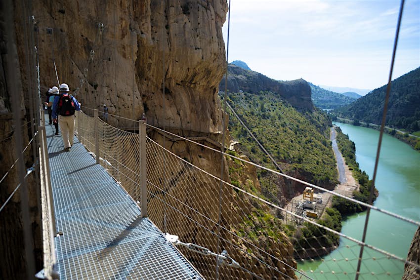 Spain, Ardales, tourists walking along The King's Little Pathway Spain, Ardales, tourists walking along The King's Little Pathway