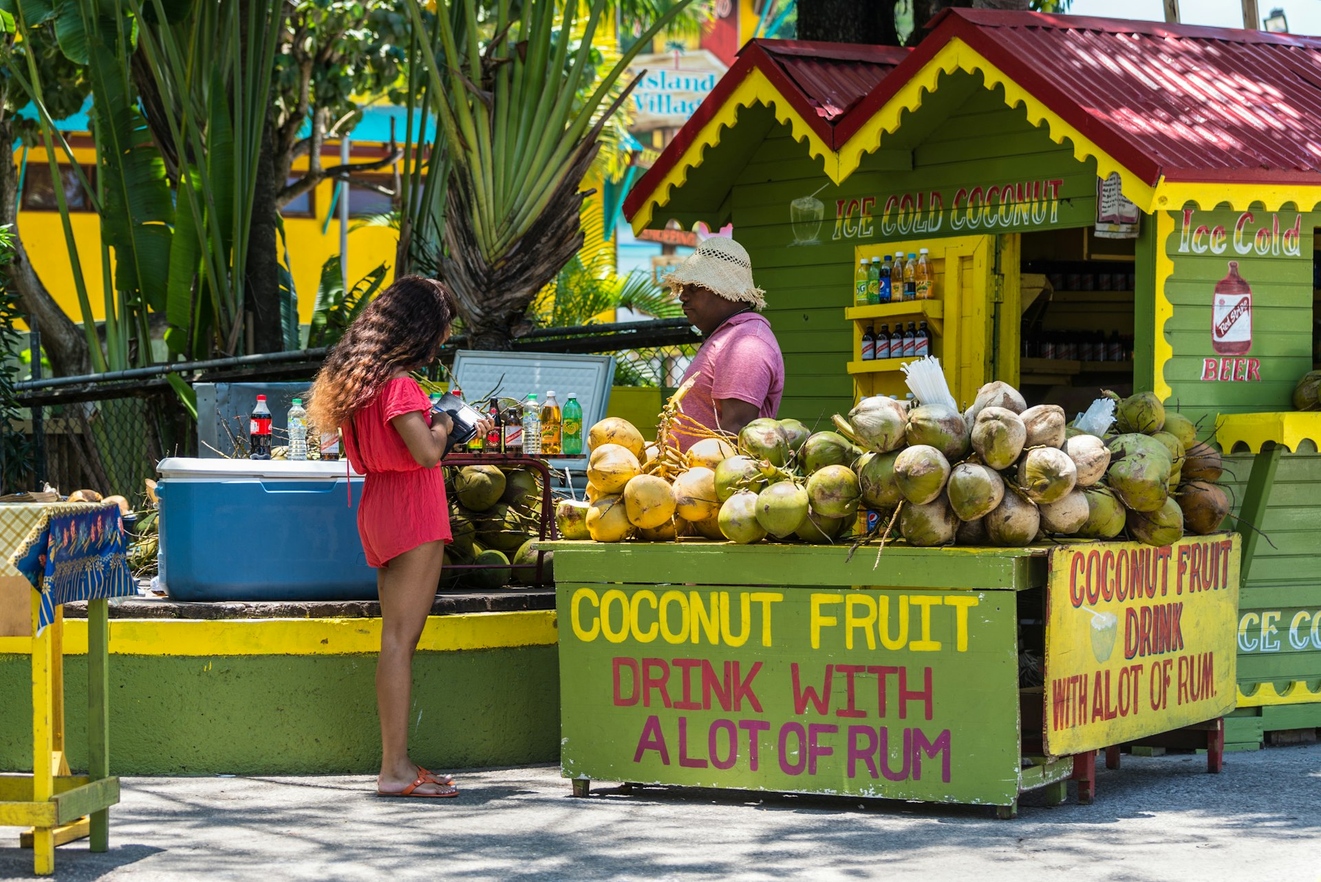 Ice Cold Coconut Fruit Drink with Rum stall/corner shop at the Ocho Rios Cruise Ship Port in the streets of Ocho Rio