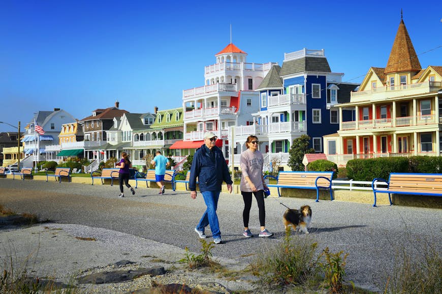 People walking on a path in front of Victorian houses in Cape May, Virginia