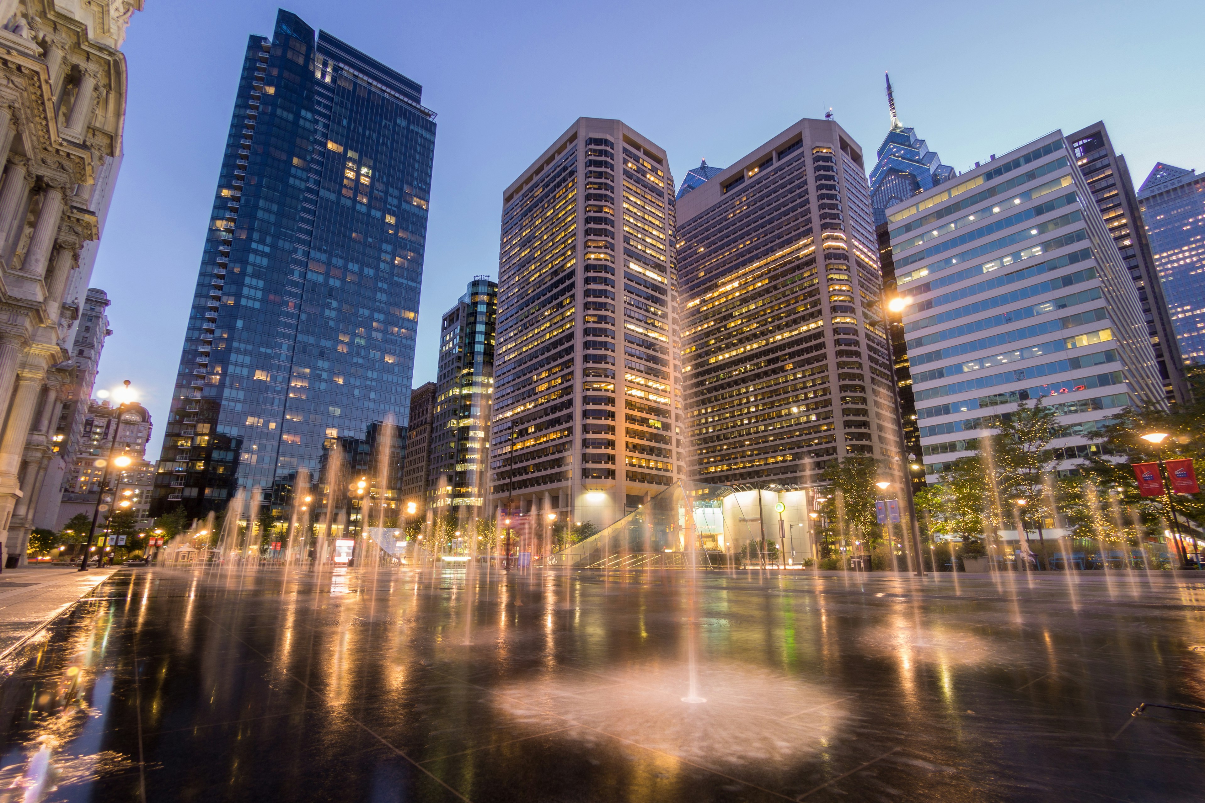 Fountains of Dilworth Plaza in Center City Philadelphia at dusk.