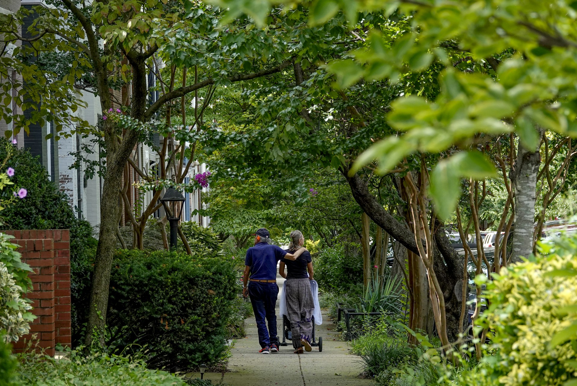 An older couple strolls through DC's Bloomingdale neighborhood 
