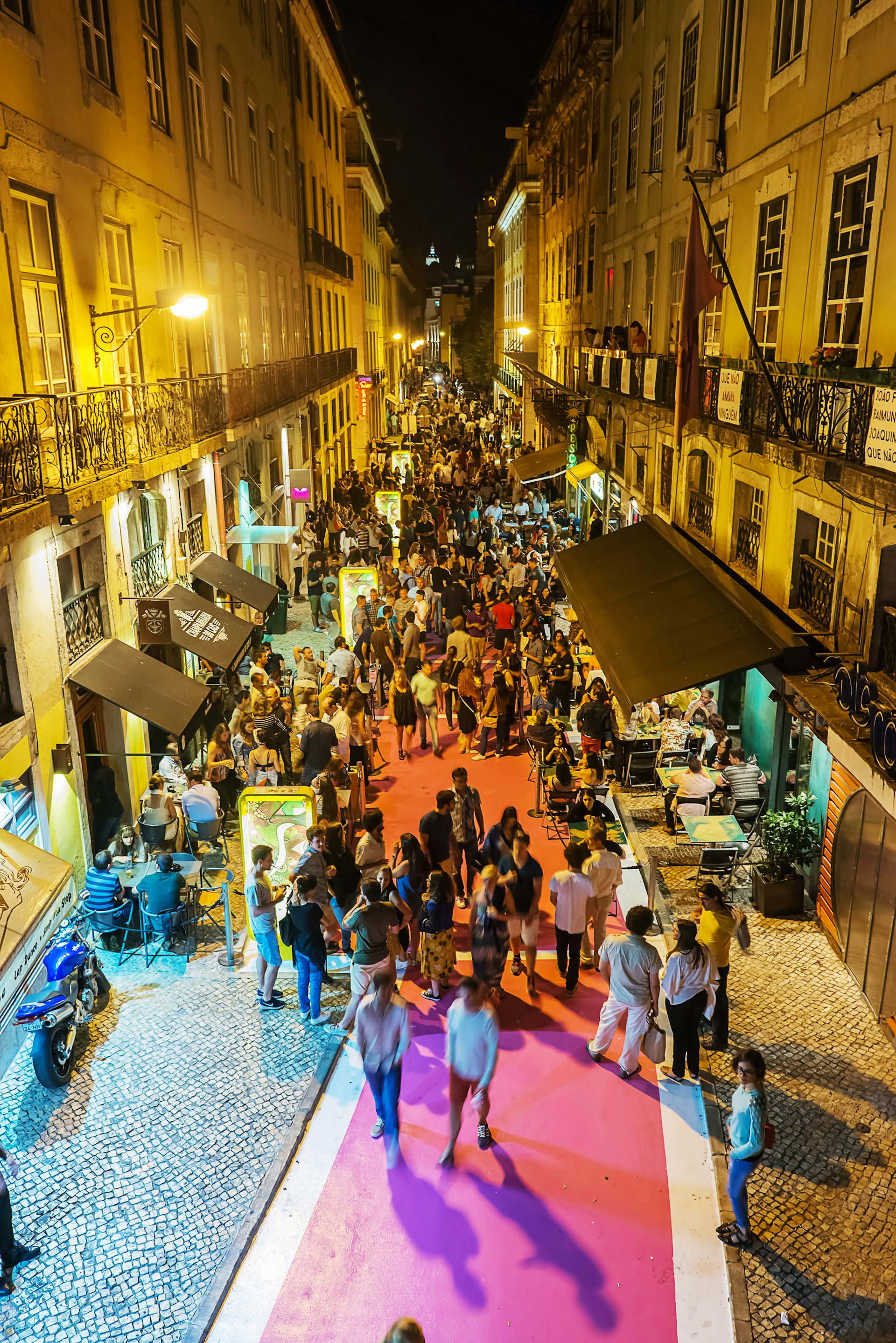 Drinkers outdoors on a Lisbon street