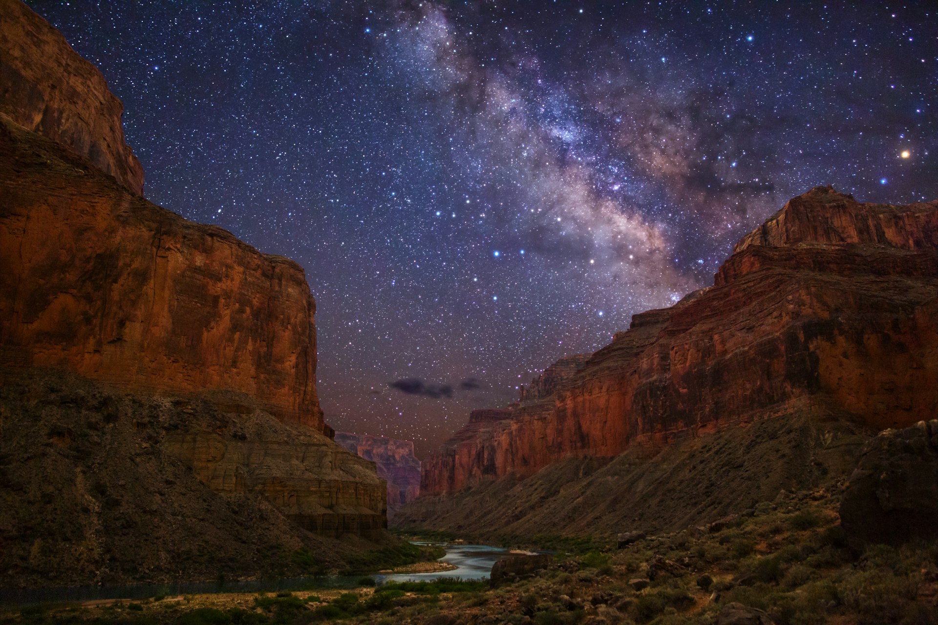 A view of the Milky Way from the bottom of a deep canyon