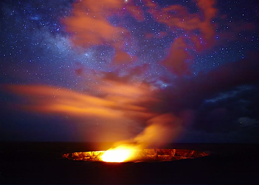 Halema'u ma'u crater and the Milky Way A volcanic crater under a starry sky