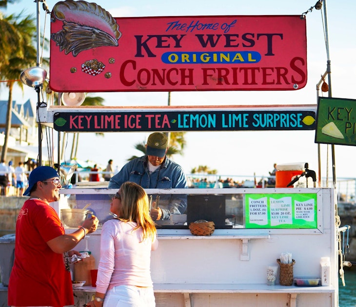Tourists at conch fritter stand on Mallory Square