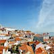 Overview of Alfama district beside Tagus River estuary.