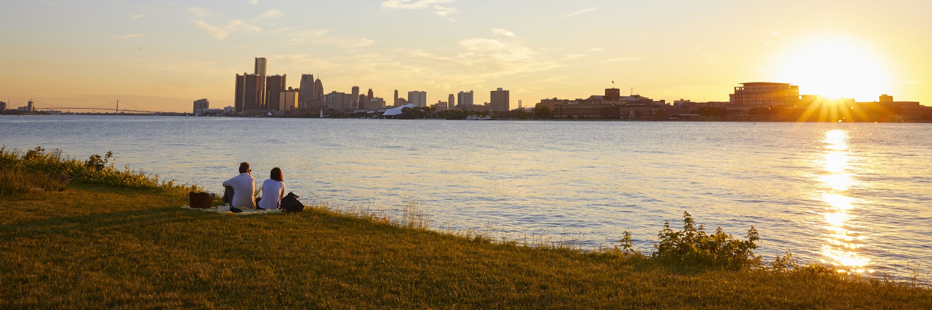 Sunset over Detroit as seen from Belle Isle in the Detroit River.