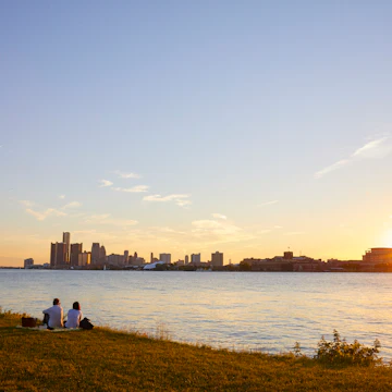 Sunset over Detroit as seen from Belle Isle in the Detroit River.