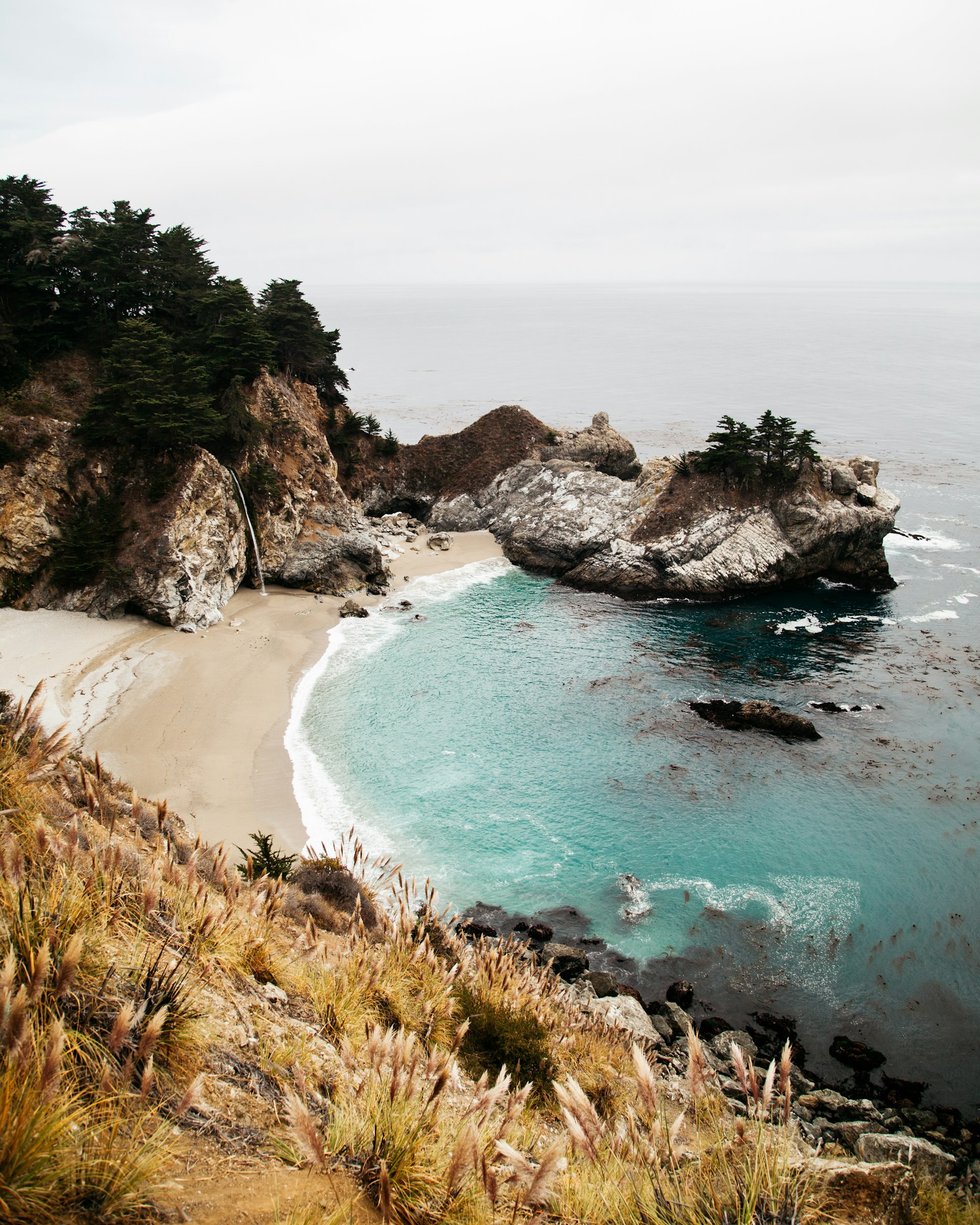 McWay falls, a waterfall on the beach, in Big Sur