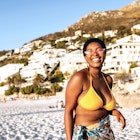 Portrait of a confident African woman at the beach, South Africa.