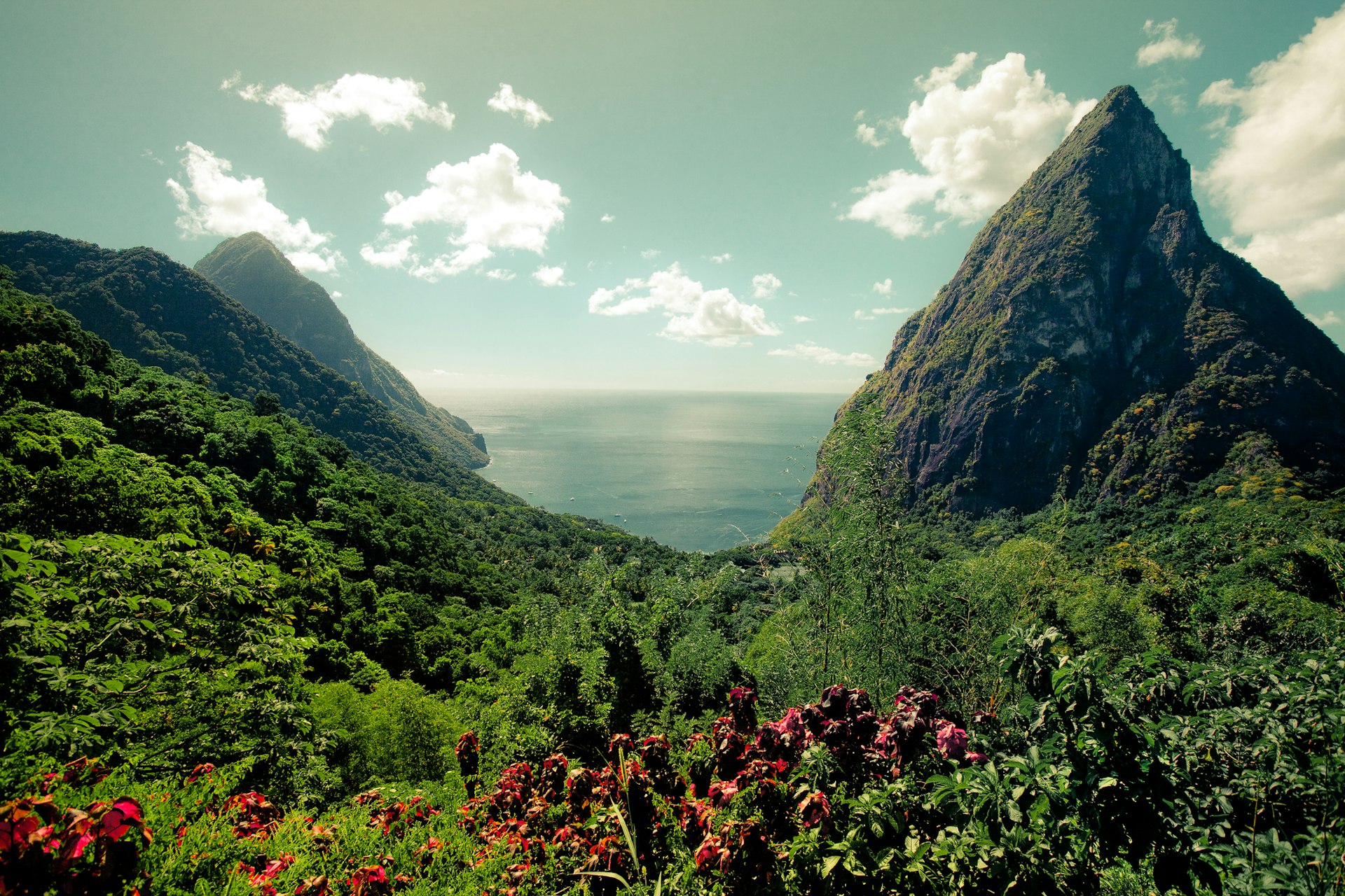 View of the verdant Pitons in St Lucia Pitons with the Caribbean Sea beyond