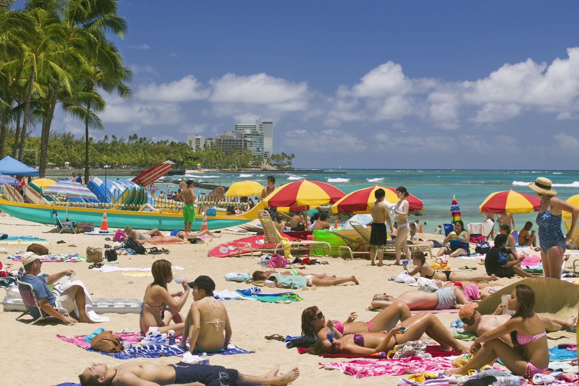 Tourists Sunbathing on Waikiki Beach