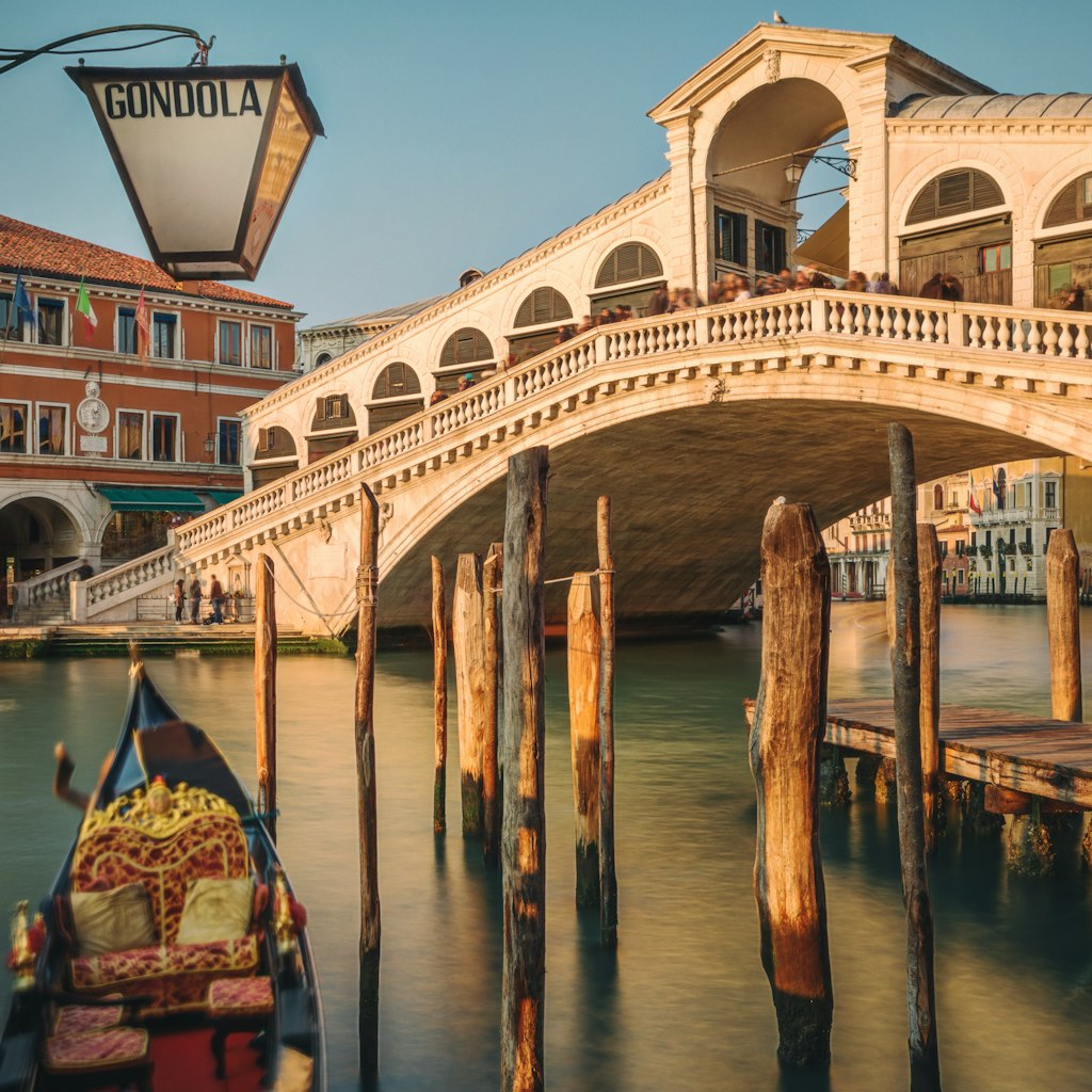 Venice is a city in northeastern Italy and the capital of the Veneto region. It is situated across a group of 118 small islands that are separated by canals.