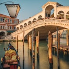 Venice is a city in northeastern Italy and the capital of the Veneto region. It is situated across a group of 118 small islands that are separated by canals.