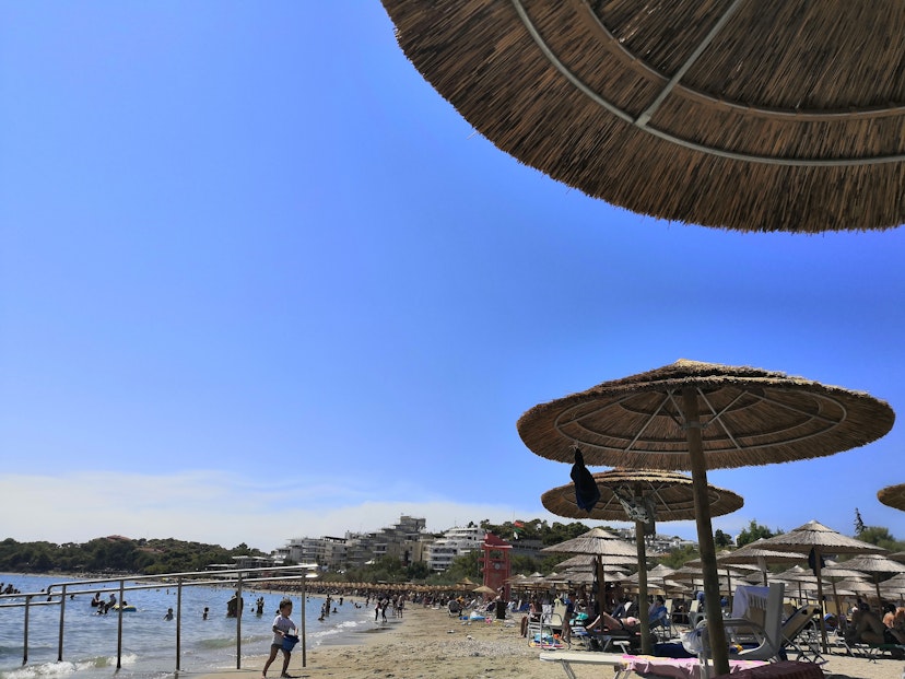 Athens, Greece, August 2021. View of Vouliagmeni beach on a hot summer day