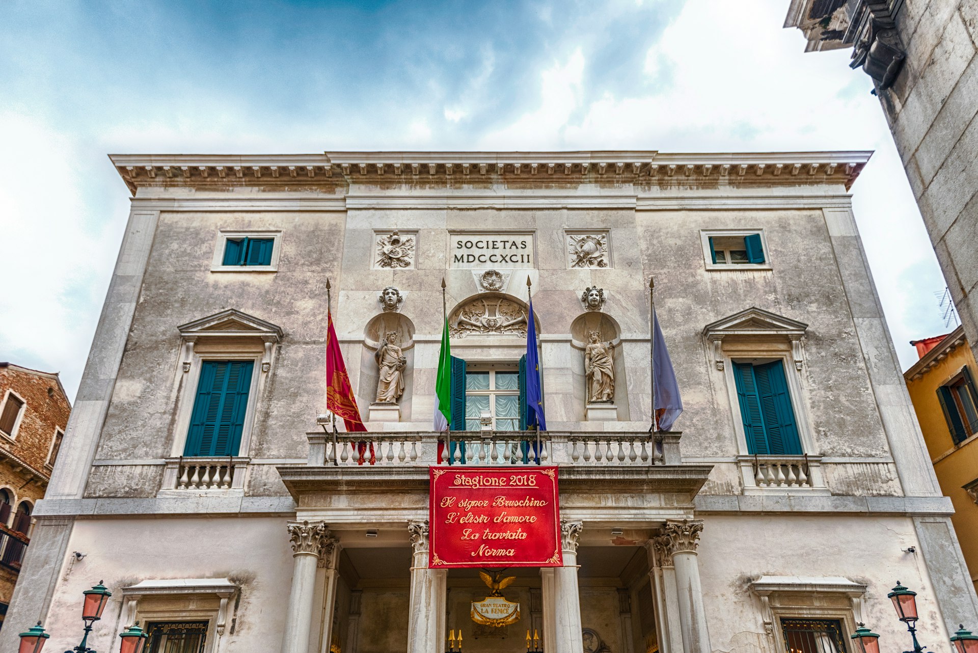 Facade of the iconic La Fenice theatre in Venice