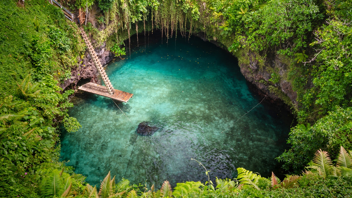 Aerial of To-Sua Ocean Trench in the rainforest.