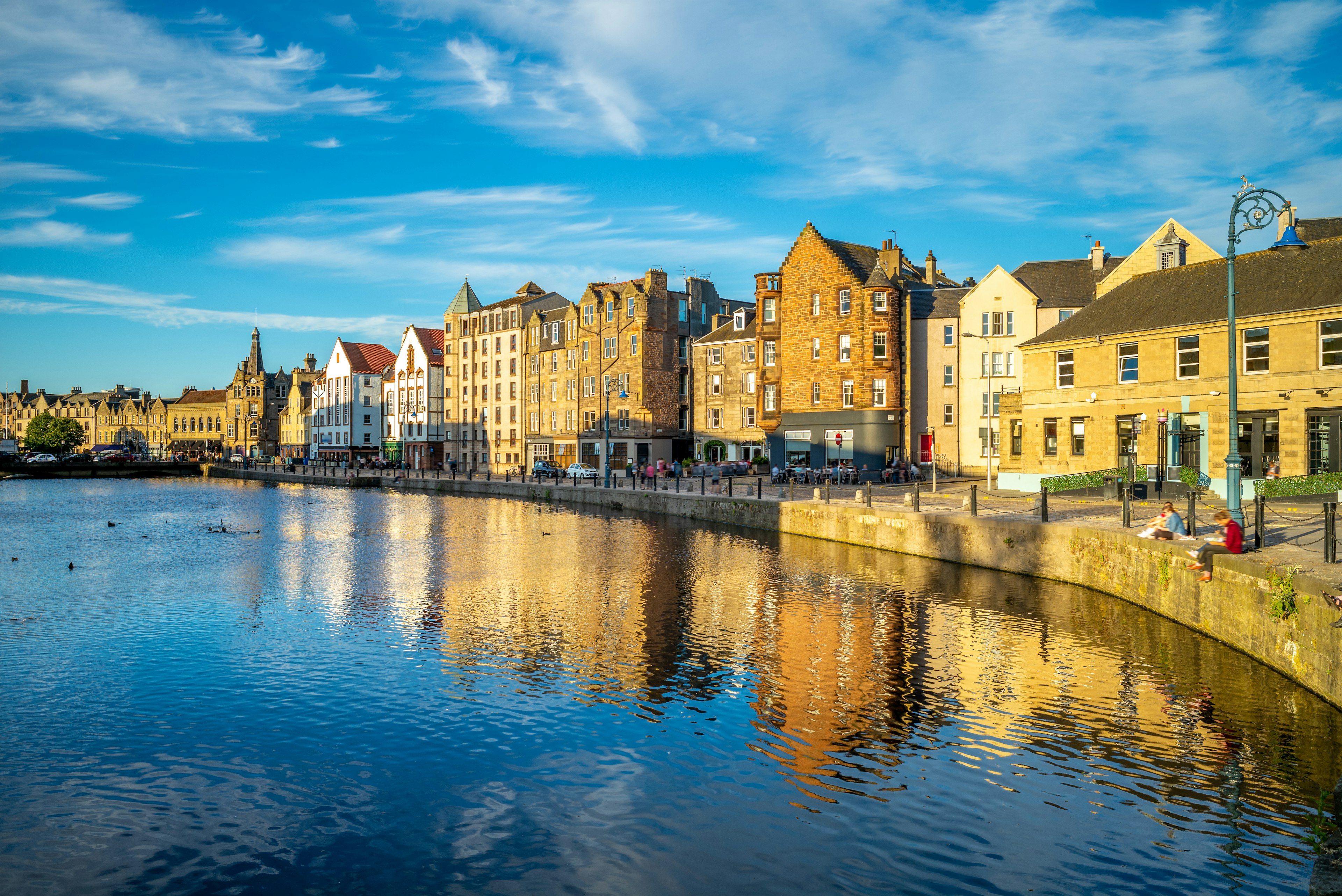 Waterfront buildings in Leith during late afternoon.