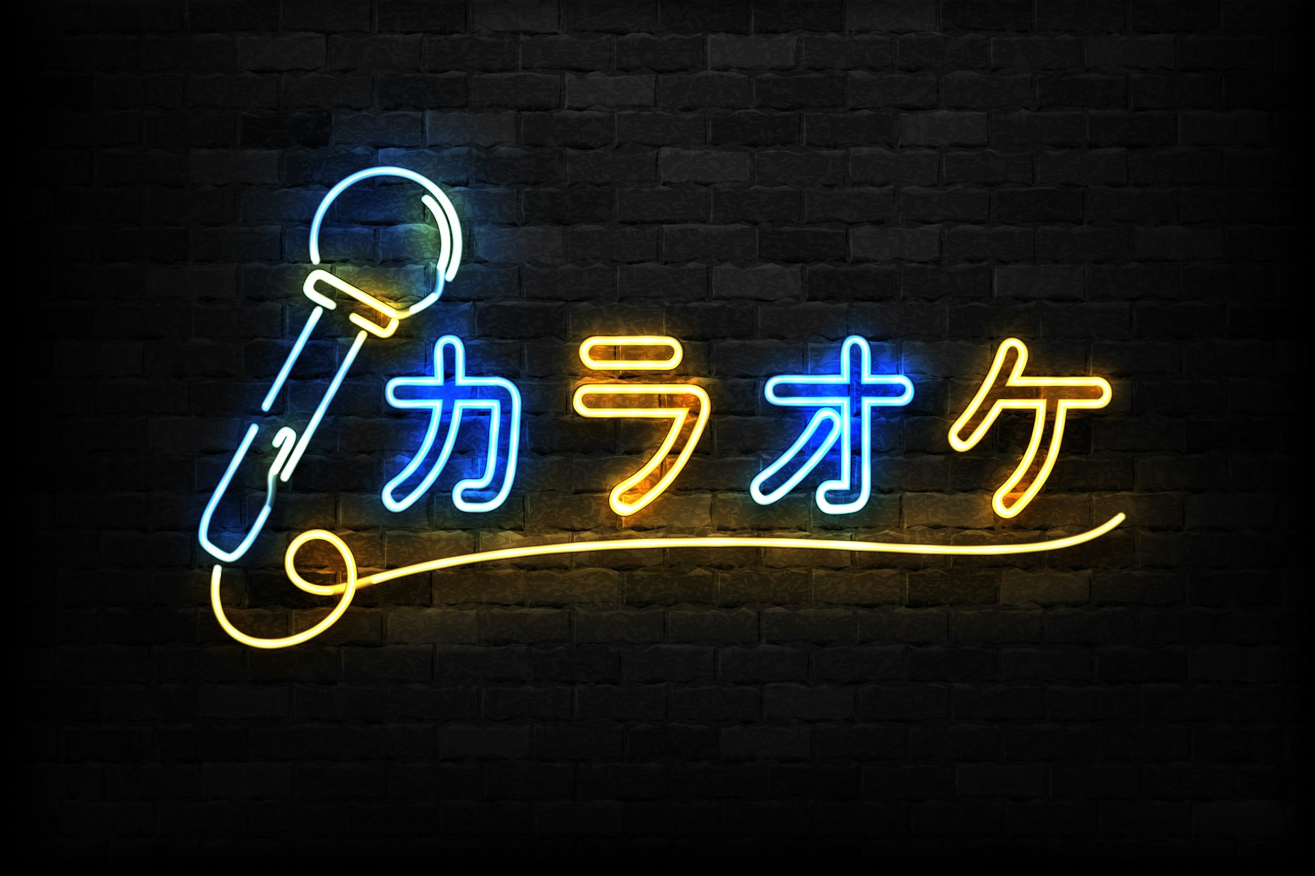 A neon karaoke sign in Japanese