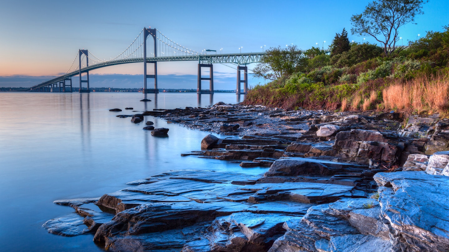 Long exposure HDR of the illuminated Newport bridge from Taylor's Point near Jamestown, Rhode Island, USA.