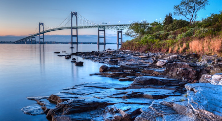 Long exposure HDR of the illuminated Newport bridge from Taylor's Point near Jamestown, Rhode Island, USA.