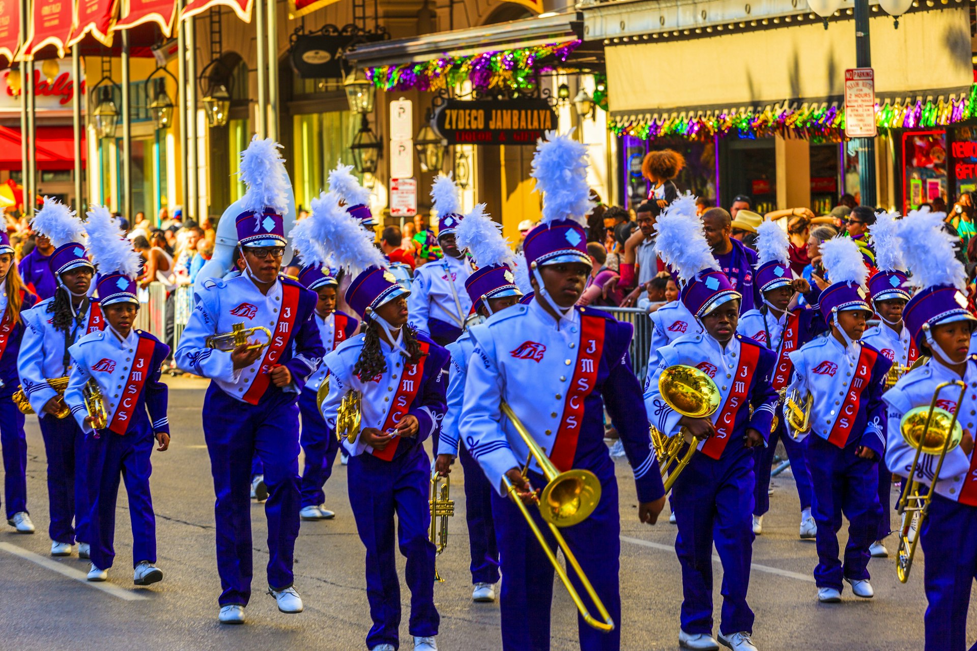 Musicians at the Mardi Gras parade march through the streets of New Orleans