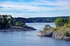 Dwellings islands on Stockholm archipelago in Baltic sea at sunny morning