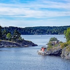Dwellings islands on Stockholm archipelago in Baltic sea at sunny morning