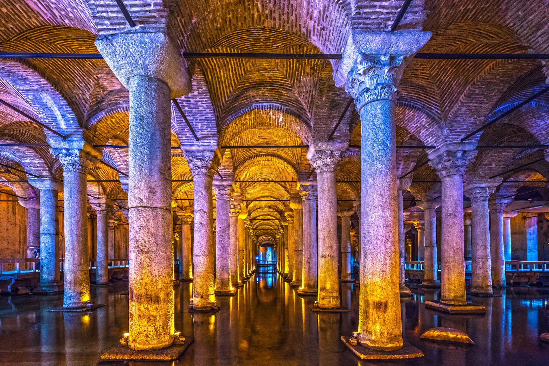 Lights illuminate the columns and arches of the Basilica Cistern in Istanbul, Turkey