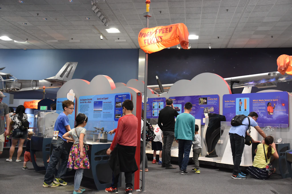 People looking at exhibits at the Smithsonian National Air and Space Museum in Washington, DC,