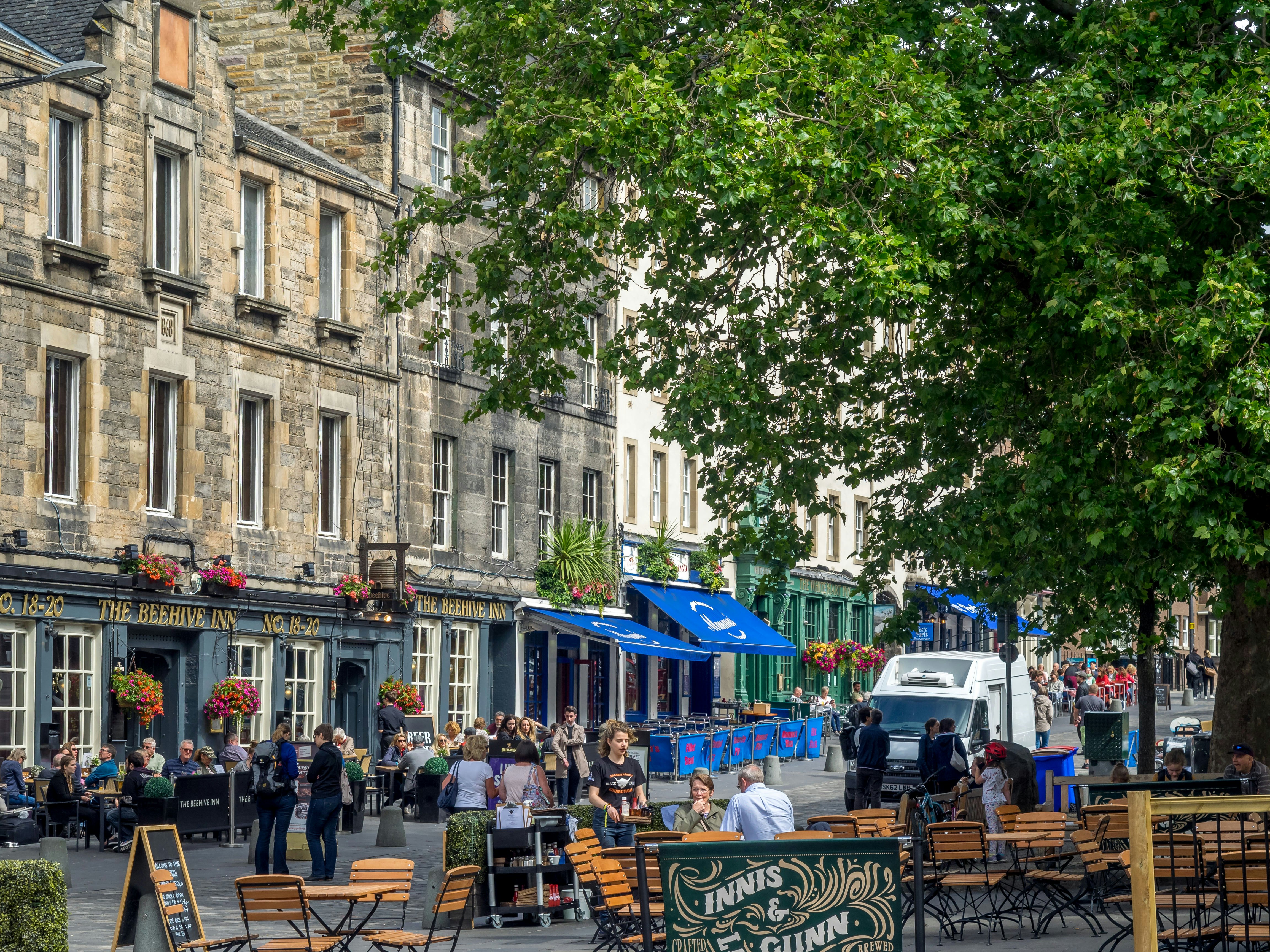 Outdoor seating at cafes and restaurants in the Grassmarket area of the Old Town, Edinburgh