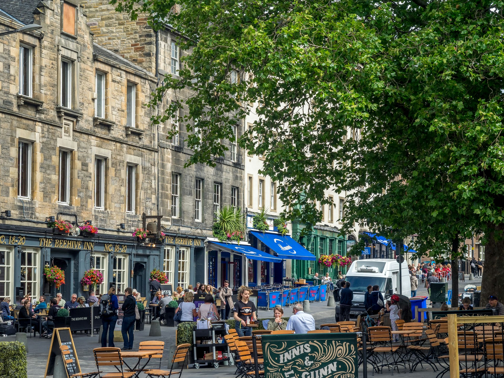 Outdoor seating at cafes and restaurants in the Grassmarket area of the Old Town, Edinburgh