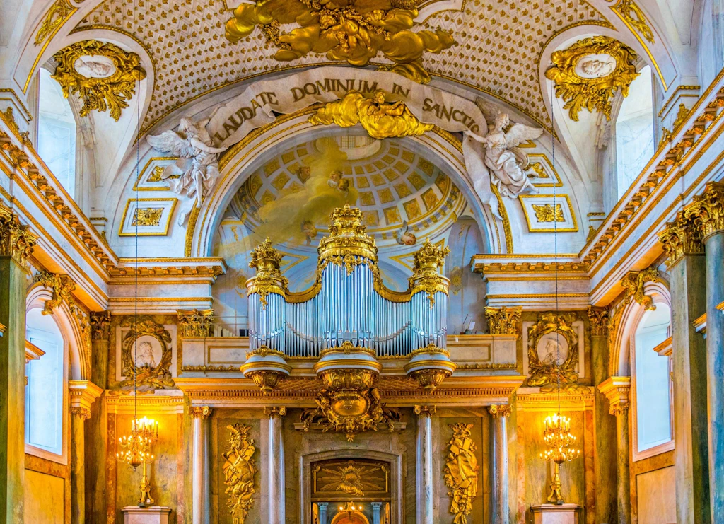 The ornate gilded interior of Slottskyrkan - the royal chapel in Stockholm, Sweden 
