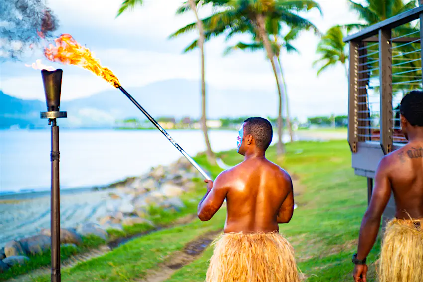Fiji beach torches Fijian people performing the lighting of the beach torches.