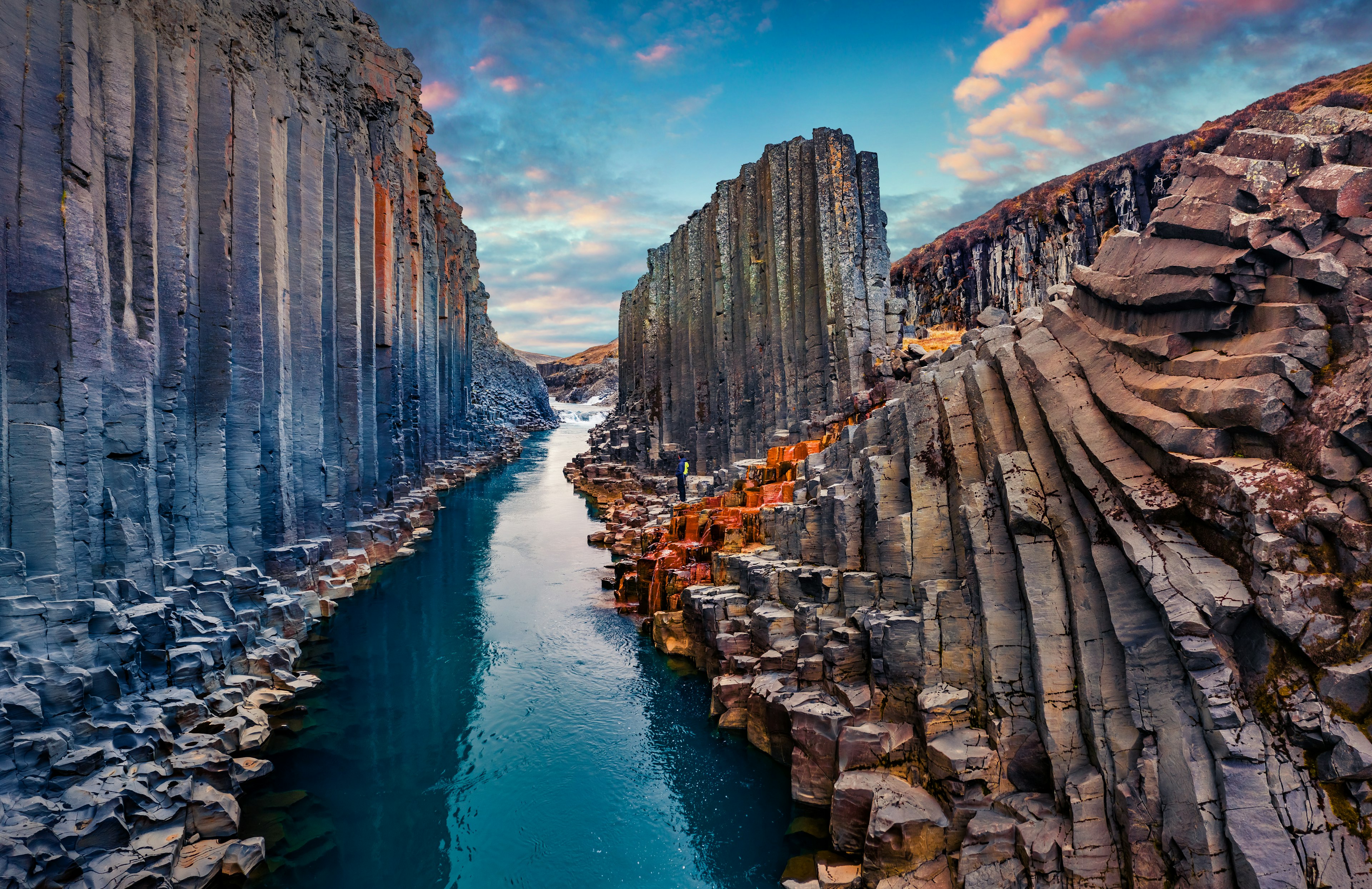 A river runs through a canyon with steep walls