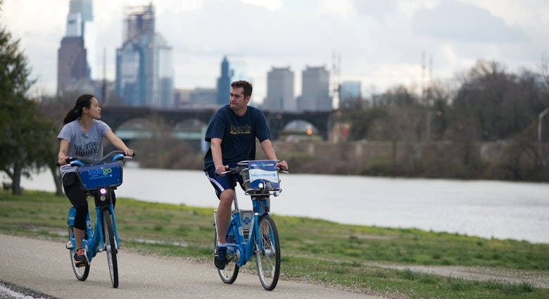 Cyclist on Indego Bike Share bikes tour along the Cherry blossoms in full bloom along Kelly Drive on the Schuylkill River Banks, in the Fairmount Park section of Philadelphia, PA, on April 4, 2017. (Photo by Bastiaan Slabbers/NurPhoto)