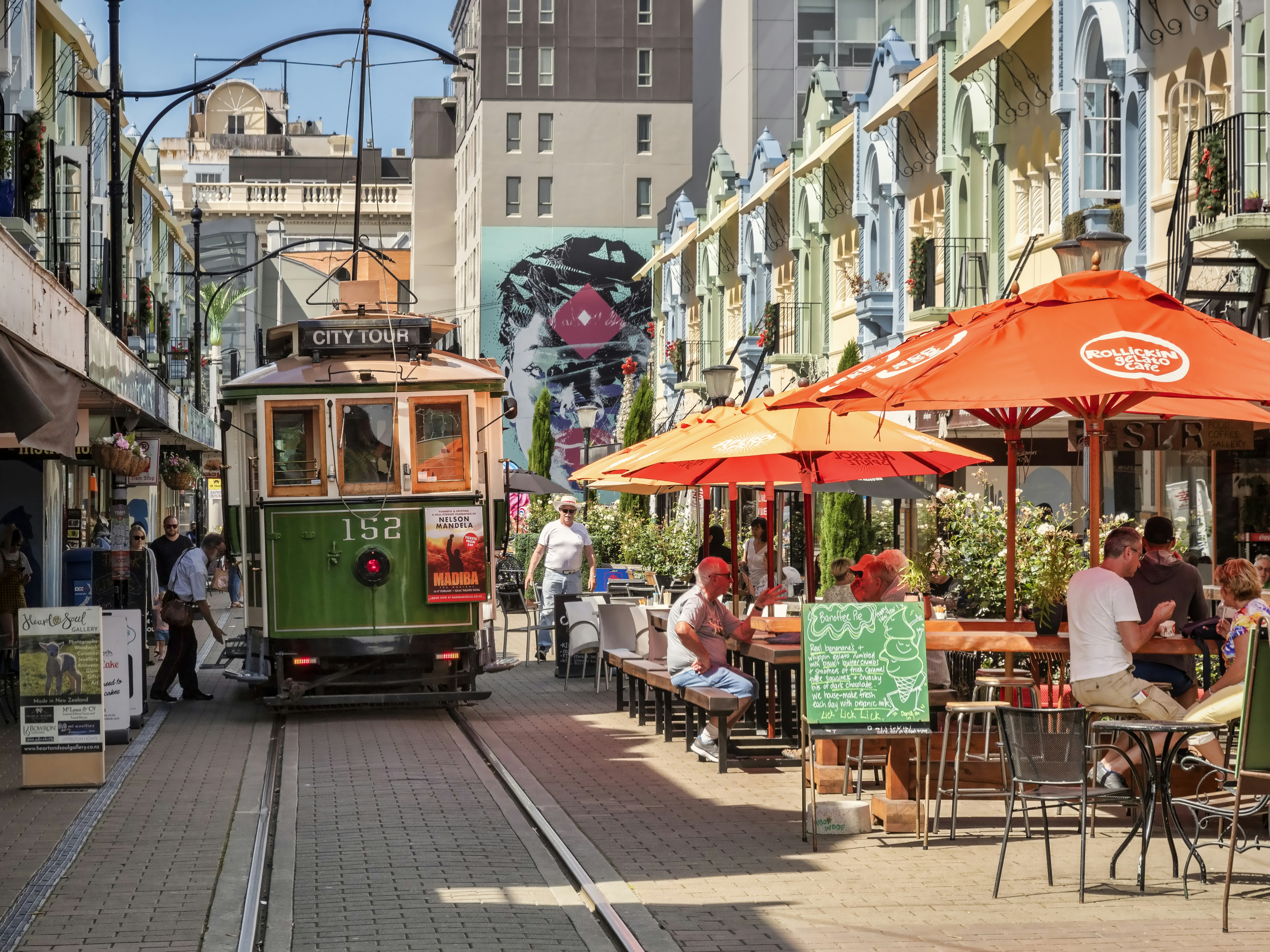 3 January 2019: Christchurch, New Zealand - New Regent Street in the centre of Christchurch, with outdoor cafes and speciality shops, and the tram route running through it.