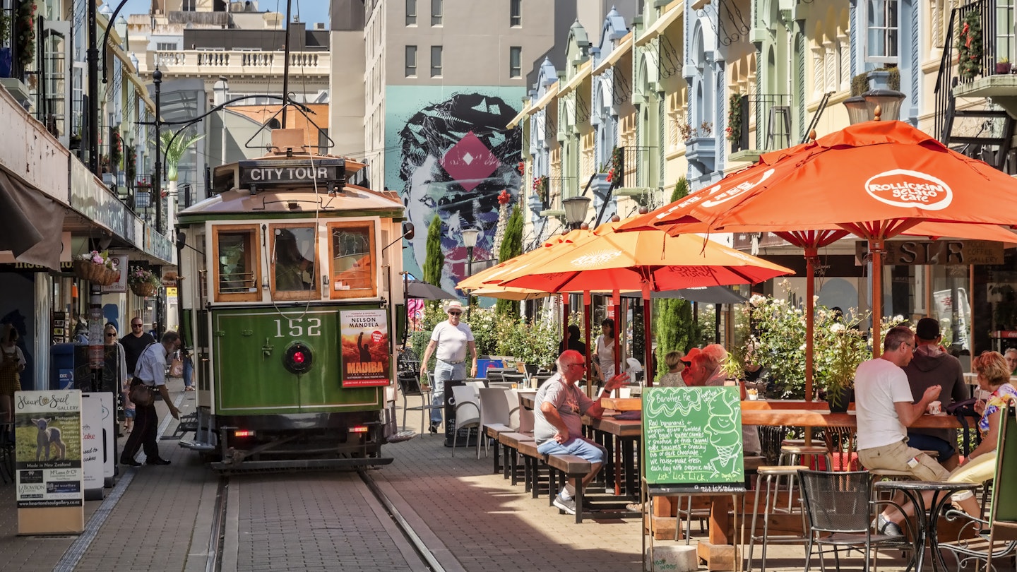 3 January 2019: Christchurch, New Zealand - New Regent Street in the centre of Christchurch, with outdoor cafes and speciality shops, and the tram route running through it.