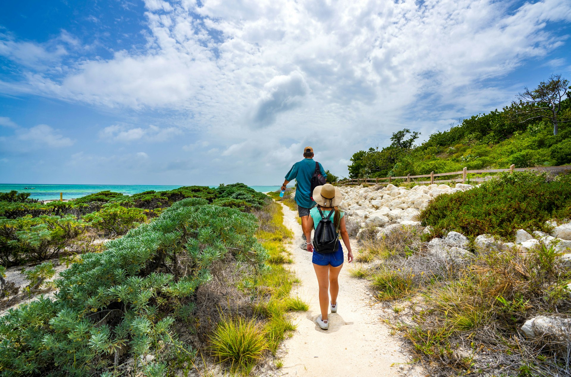 Couple walking to the beach in the Florida Keys