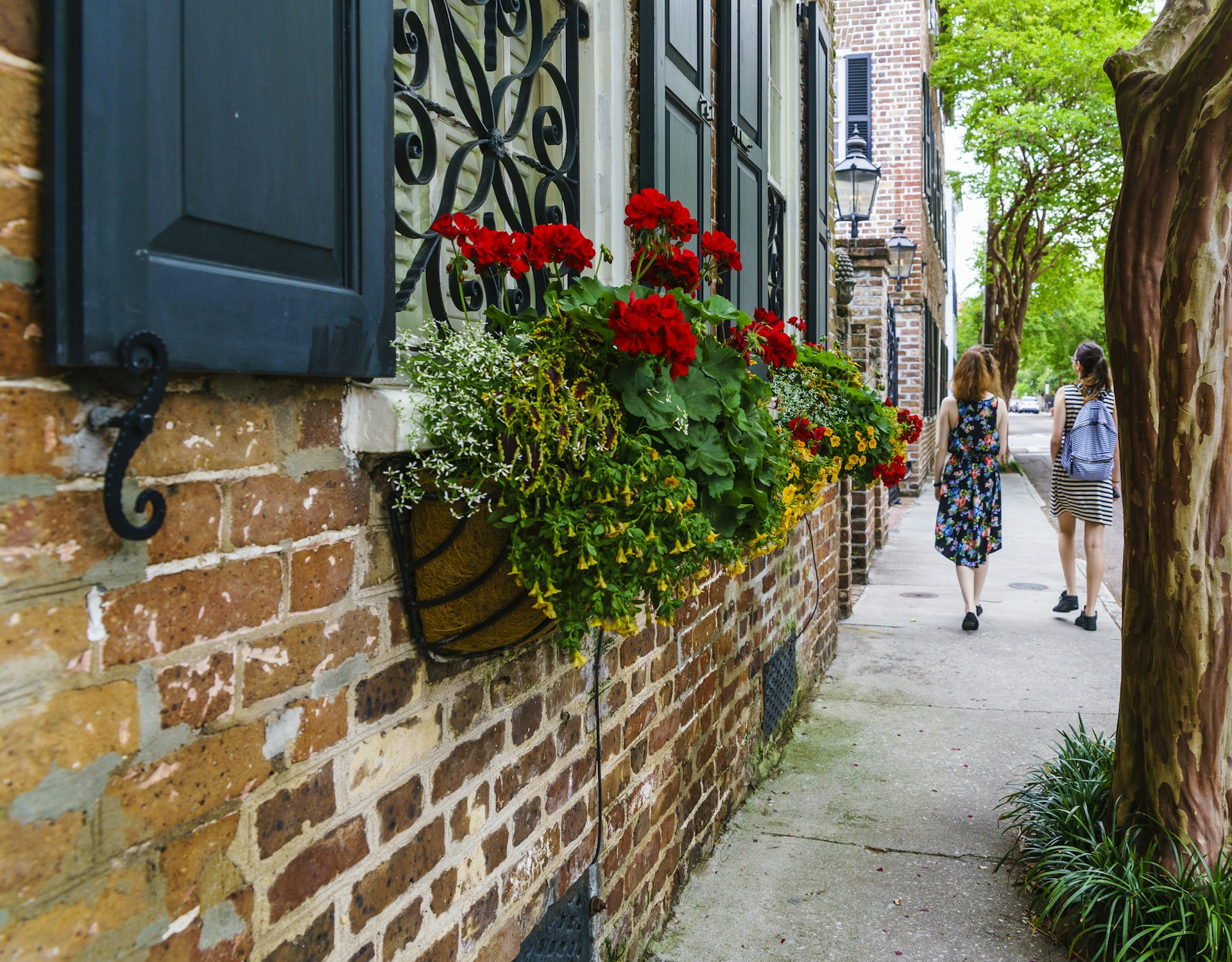 Two teenage girls on the street of Charleston, South Carolina