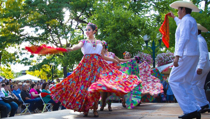 Santa Fe, NM, USA - September 17, 2016: A dance troupe performs a Mexican folk dance on the historic Santa Fe, NM Plaza during a Mexican Independence Day celebration. New Mexico was part of the Mexican Republic for 25 years and has many citizens of Mexican heritage.