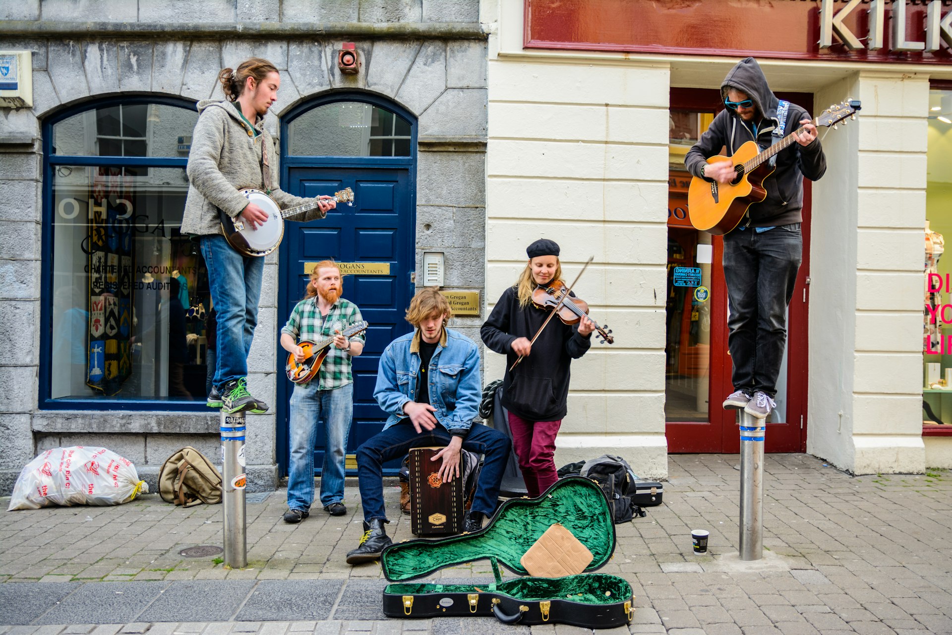 Irish musicians playing at Galway Street, busking