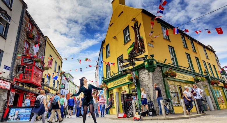 Traditional folk dancer dancing in Galway village center