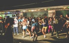 Kingston, Jamaica - June 26, 2008: Crowd enjoying reggae/dancehall music and dancing at ghetto street party, called "Passa Passa", Tivoli Gardens.