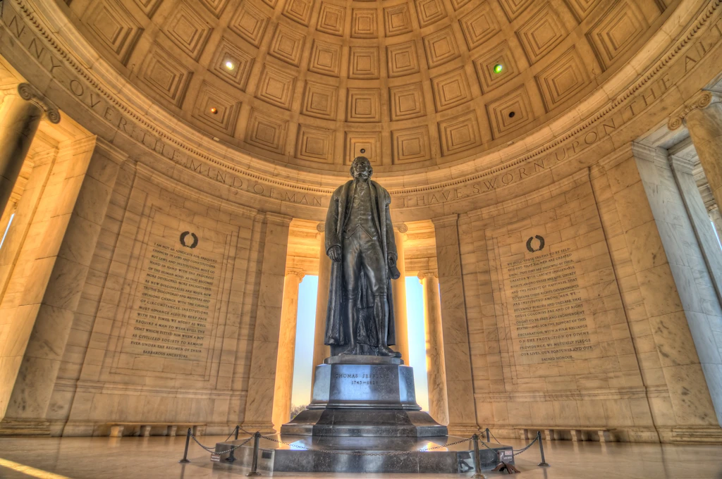 Interior of the Jefferson Memorial A view of the interior of the Jefferson Memorial, with a bronze statue of Thomas Jefferson stood on a plinth.